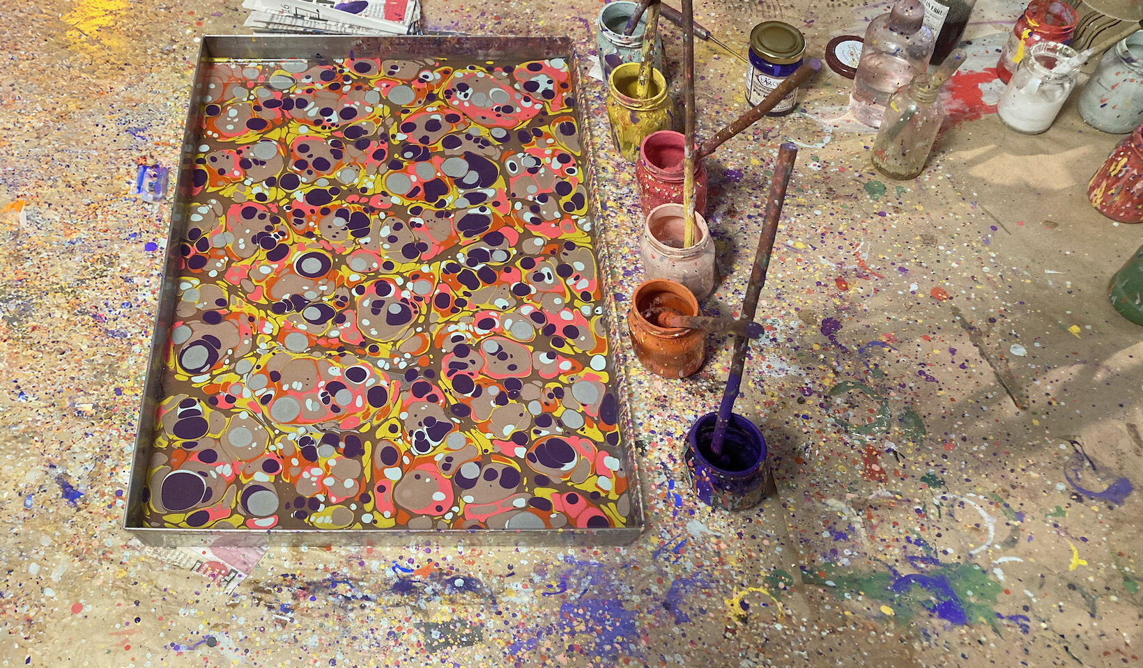 Saverio Tonoli, paint on water, view of the Ebru technique set up, 2025