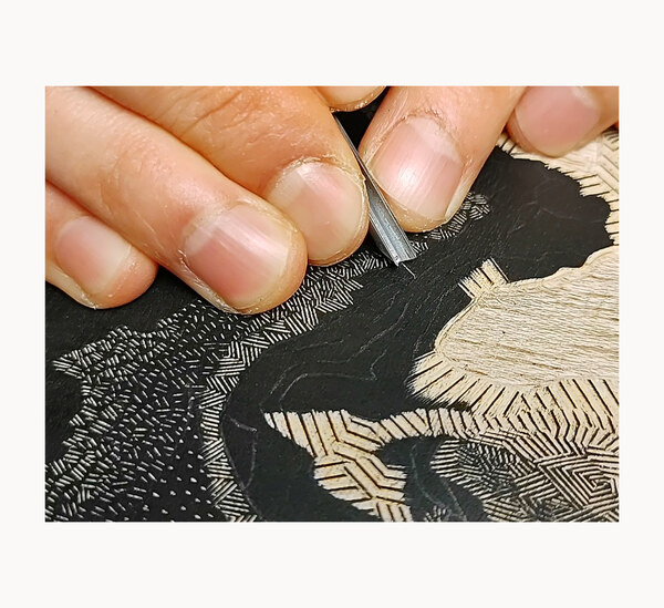 carving a woodblock